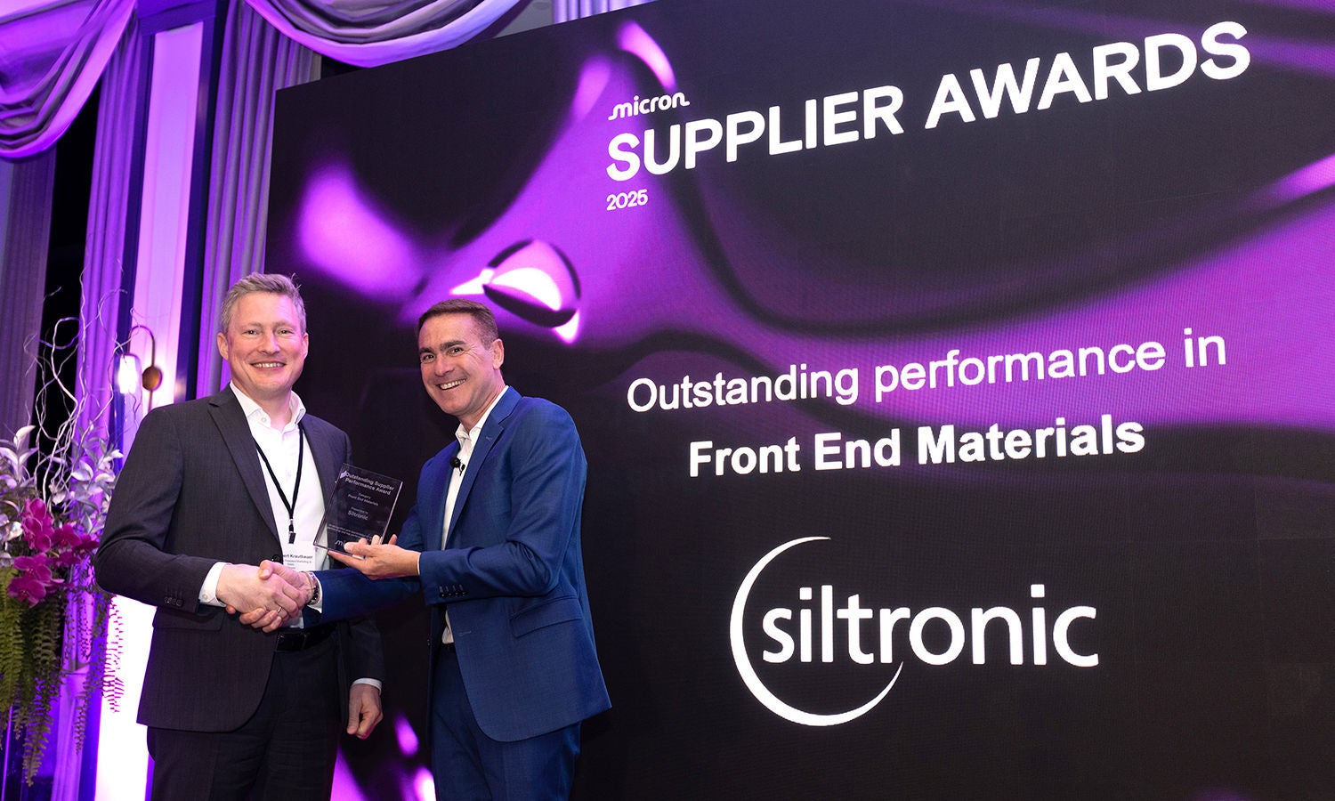 Ben Tessone presenting the Outstanding Performance Award to Dr. Rupert Krautbauer